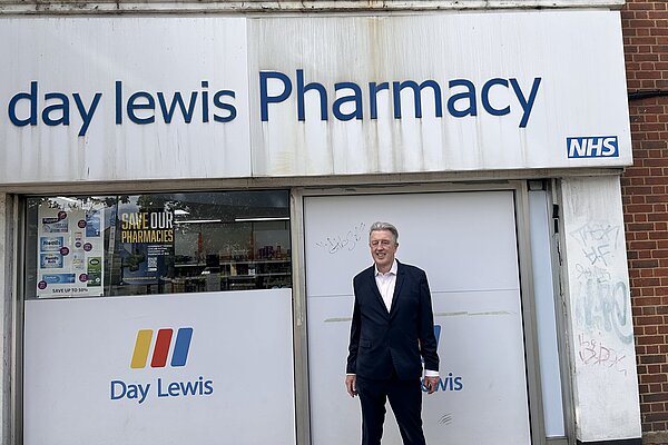 Paul outside pharmacy