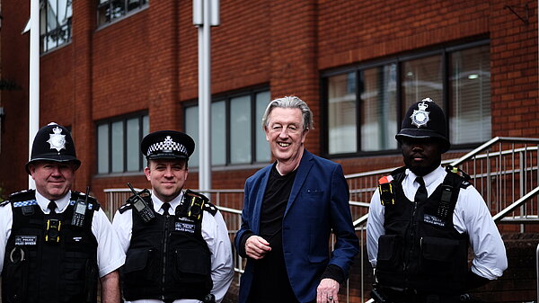 Paul with local police